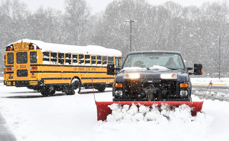 Sorry, students. H.O.B. chief custodian John Currie clears the parking lot at the Milton school. DAN COOK PHOTO