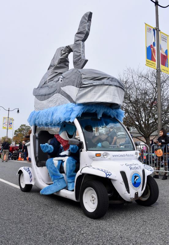The Rehoboth Beach-Dewey Beach Chamber of Commerce dolphin and wicked whale lead the parade. RON MACARTHUR PHOTO