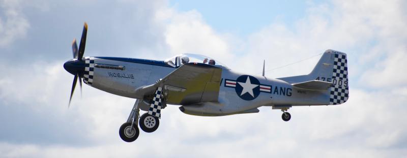 Rosalie, a P-51 Mustang, takes off to start the flyover. The P-51 was used during World War II and the Korean War.