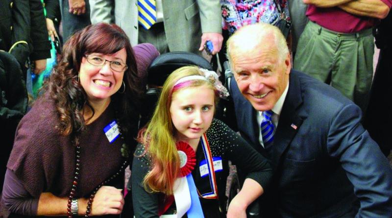 Lilly Barnett, center, was ambassador for the 2012 Return Day Parade in Georgetown. Kelly Barnett, Lilly’s mom, said “Joe made sure to part the sea of people to get Lilly to him to get this photo.”