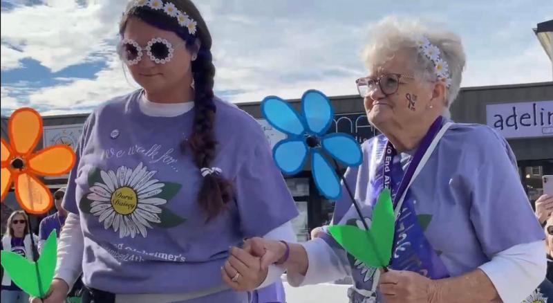 “I will stand by you in weal or woe, Daisey, Daisey.” - Harry Dacre. The Alzheimer’s Association uses flowers to signal a person’s role when it comes to the disease. The blue flower indicates Doris Daisey is living with Alzheimer’s, while the orange flower indicates Karson Barenholtz is caring for Daisey. SUBMITTED PHOTO