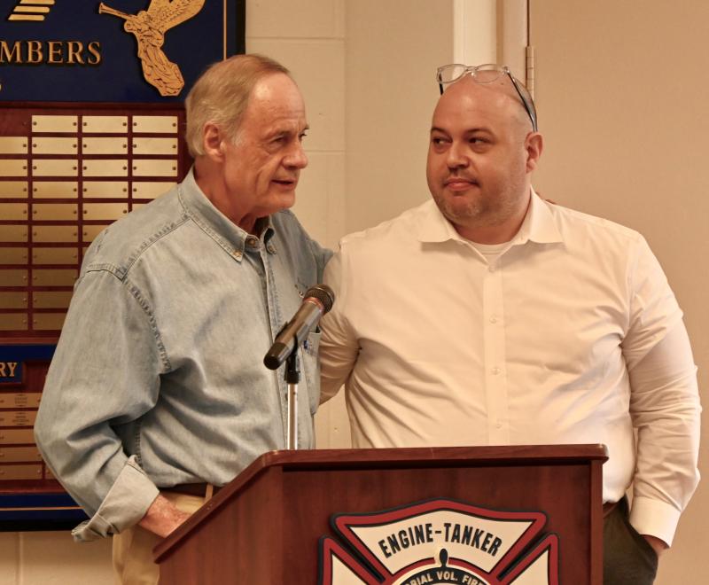 U.S. Sen. Tom Carper, left, thanks staffer John Kane for his work on the Water Resources Development Act and securing $25 million for bay beach renourishment projects.