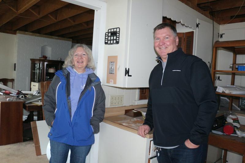 Bernadette Walsh Hearn visits her childhood home, Walshland, with The Starboard proprietor Steve “Monty” Montgomery, one of several investors who purchased the oceanblock property four years ago. Currently under renovation, the structure will house two residential units and a retail space. ELLEN DRISCOLL PHOTO