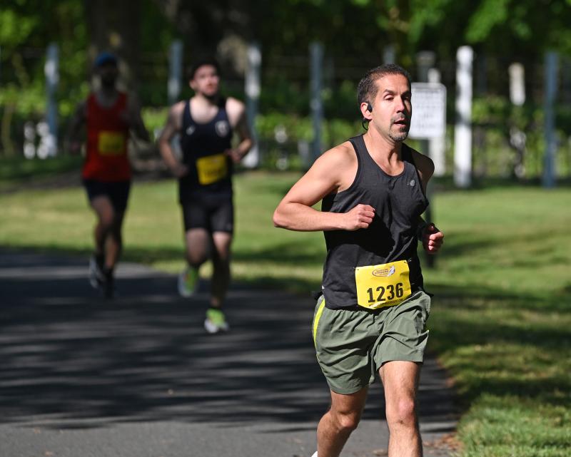 Matt Sparacino, 46, of Harrington heads to the front of the pack early in the race. He finished second overall and won the male masters title with a time of 18:07.