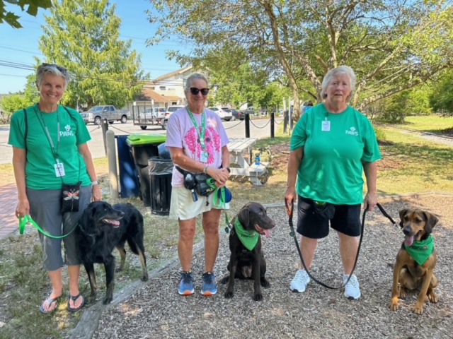 Paws for People, a nonprofit that helps provide therapy dogs, was on-hand with some of their furry friends. Shown are (l-r) Kathy McGinley and Marley, Gail Hamman and Dolce, and Theresa Pitts and Zoey.