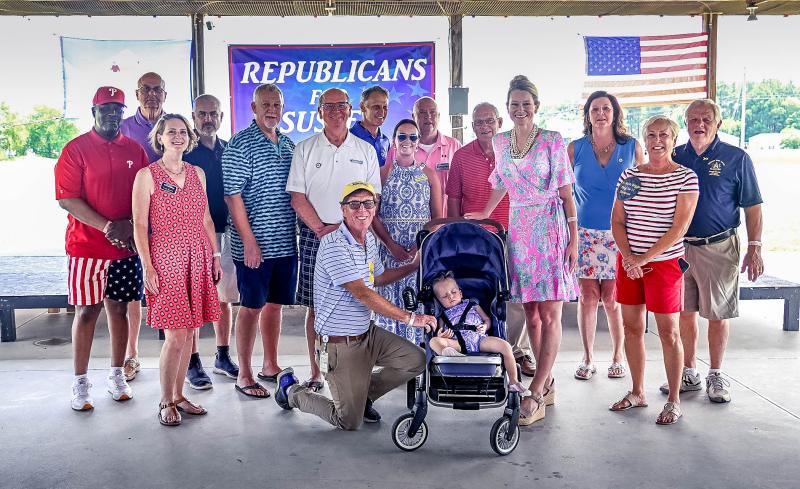 Republicans in Sussex County attending the annual Big Tent Event include (l-r) Greg Fuller, register of wills; Mike Vincent, Sussex County Council president; Kim Hoey Stevenson, candidate for Senate District 6; Rep. Tim Dukes, R-Laurel; Rep. Jeff Hilovsky, R-Long Neck; Rep. Ron Gray, R-Selbyville; Nikki Miller, candidate for Representative District 20; Mike Simpler, candidate for Representative District 14; Rep. Rich Collins, R-Millsboro; Alexandra Baker, recorder of deeds; Rep. Valerie Jones Giltner, R-Georgetown; former Rep. Ruth Briggs King, candidate for lieutenant governor; Sen. Gerald Hocker, Senate minority leader, R-Ocean View; and, in front, Mike Ramone, candidate for governor. DAN COOK PHOTOS