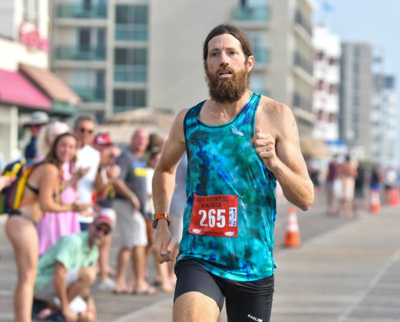 Mike Wardian blows away the running competition to finish fourth overall and win the male masters title.