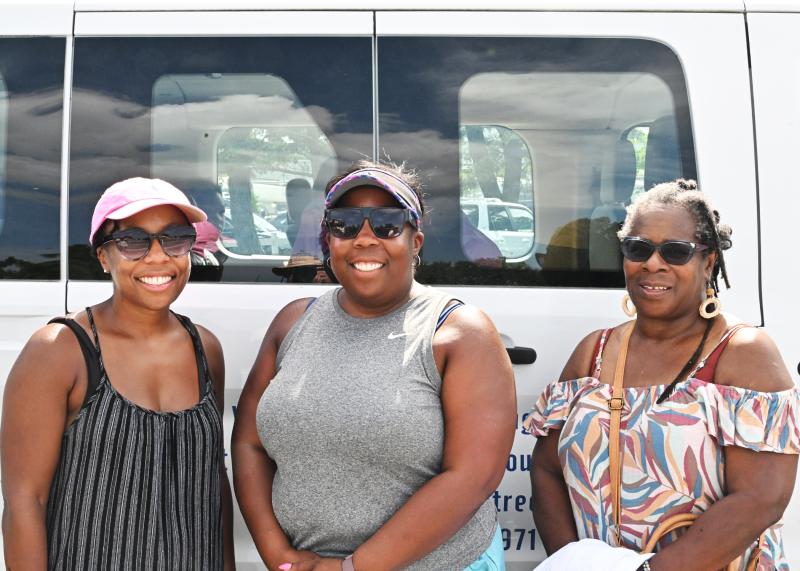 Joining the children from West Rehoboth Children and Youth Program are (l-r) Latoya Bonville, program director Dilinda Deshields and Marilyn Mock.