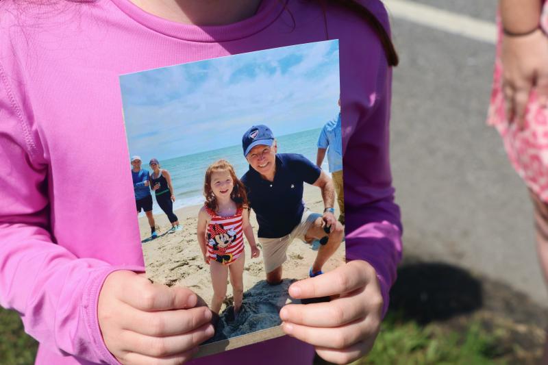 A closer shot of the prized picture of then-4-year-old Miriam Moskowitz with President Biden taken on the beach at Gordons Pond.
