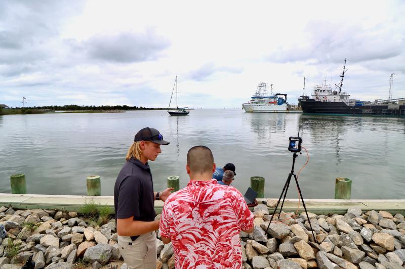Researchers at the Project Able Autonomous Systems Bootcamp operated micro-marine vehicles in UD’s boat basin.