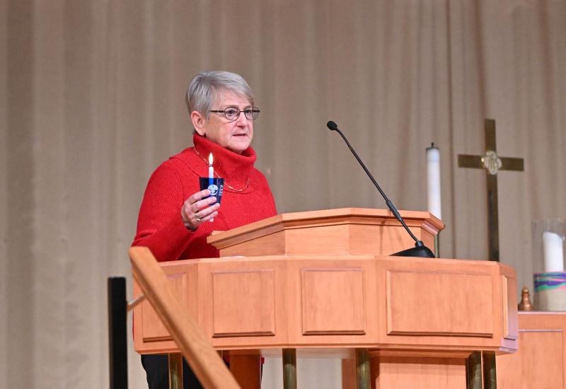 Marge LaFond reads the poem “Someone is Missing Today.” She then read the names of children who have died. The bell tolled in their memory.