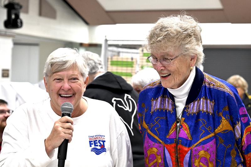 Kim Smitas, event coordinator, left, stands with Gretta Cammermeyer, a retired colonel who challenged the military’s anti-gay policy. Cammermeyer was portrayed by Glenn Close in “Serving in Silence,” a TV adaptation of her book by the same name.