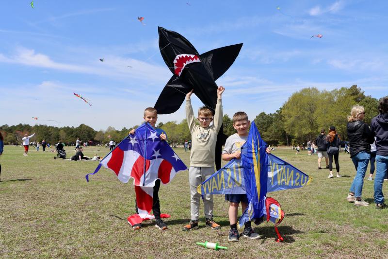 These frequent flyers had a variety of kites. Shown are (l-r) Alex Ezell with the stars and stripes, Keller McCarty with the shark and Colin Ezell ready for takeoff with the Blue Angels.